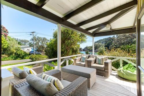 Drop Anchor at Enclosure Bay Beach by Waiheke Unlimited, Oneroa