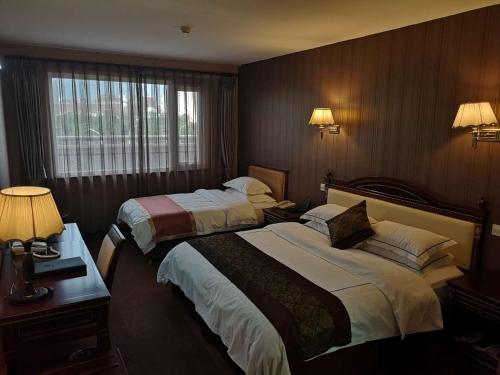 Beijing Commercial Business Hotel Set in a prime location of Beijing, Beijing Commercial Business Hotel puts everything the city has to offer just outside your doorstep. The property offers guests a range of services and amenities des