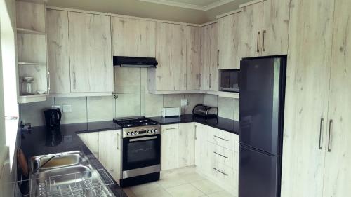 مطبخ, Knysna Paradise Guesthouse in باراداس