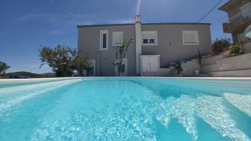 Apartments with a swimming pool Gustirna Trogir - 16233