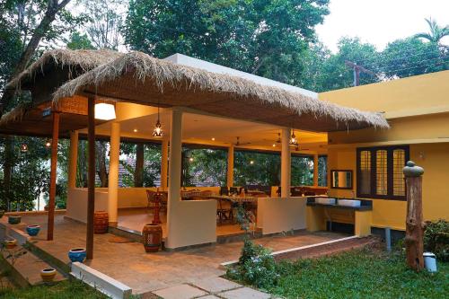 Restaurant, Raindrops Resorts Wayanad in Nenmeni