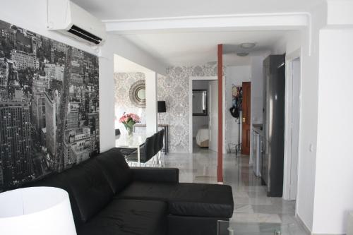Two-Bedroom - Attic room in Apartamentos Avenida