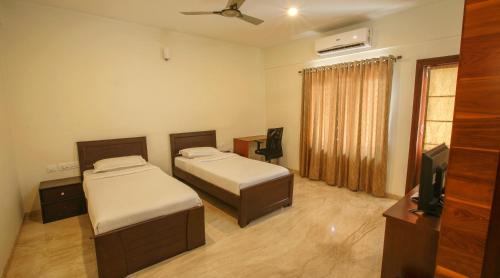 Falcon Suites Yelahanka New Town photo 1