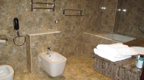 Vannas istaba, Oasis Hotel in Alžīra