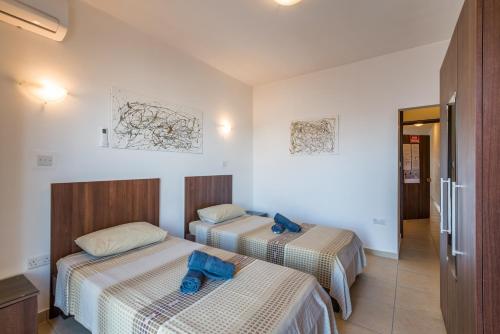 Seashells Penthouse with sunny terrace with stunning sea views in Bugibba - by Getawaysmalta - image 6