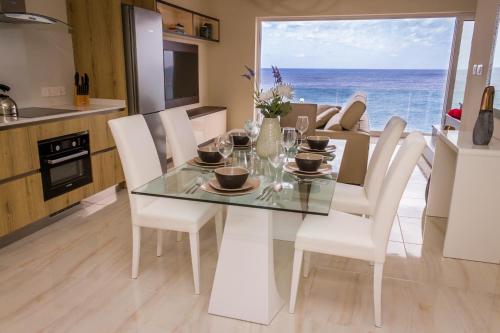 Seaside Serenity Corner by AURA in Xghajra