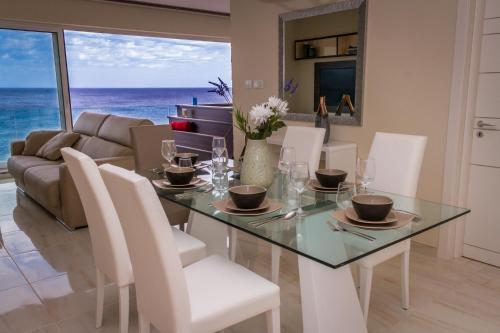 Seaside Serenity Corner by AURA in Xghajra