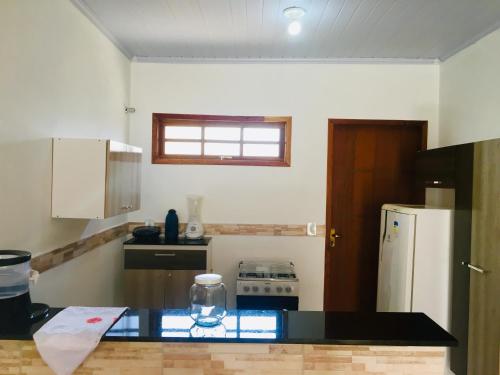 Two-Bedroom House room in Casas Aconchegantes Temporada
