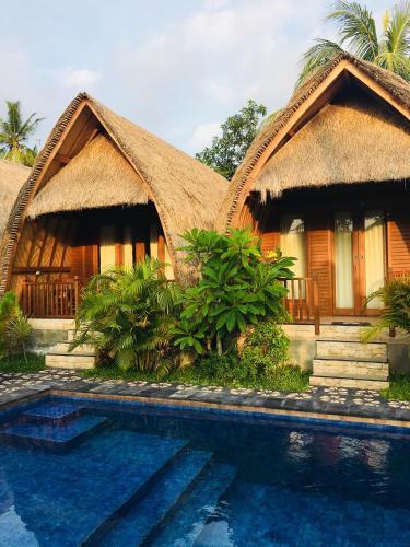 Bungalo 28 m² dengan 1 kamar tidur dan 1 kamar mandi pribadi di Nusa Penida (The Sandat Bungalow)