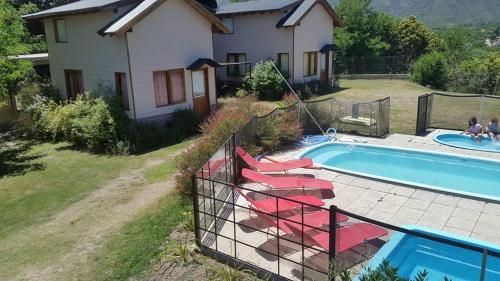 Altos del Pucara Piscina Climatizada vista a las sierras juegos infantiles in อวยร์ตา กรังเด