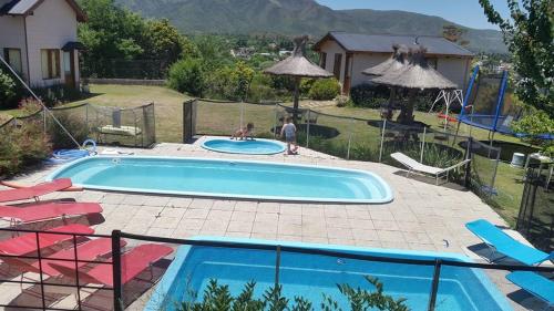 Altos del Pucara Piscinas Hidromasaje Vista Panoramica juegos infantiles huerta