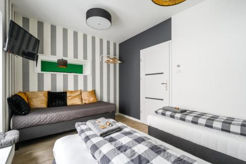 Labo Apartment Dzialdowska, Varšava (fotografie 10)