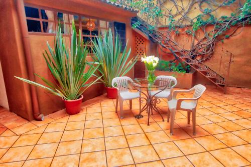 ระเบียง/ชานเรือน, Hotel Casa Encantada in ปัทซ์คูโร่