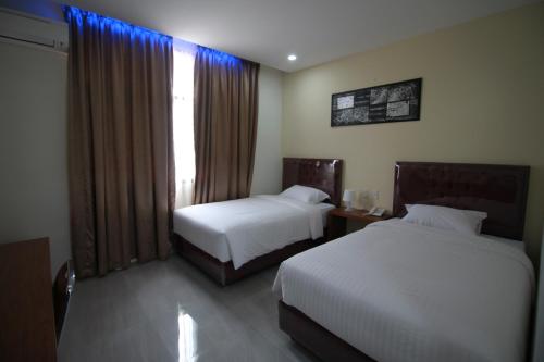 B&B Banda Aceh - Grand Mahoni Hotel - Bed and Breakfast Banda Aceh