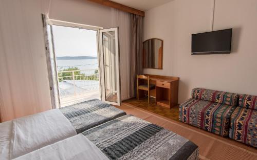 Quadruple Room with Balcony