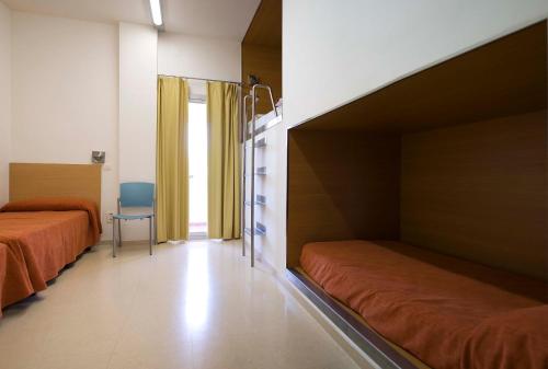 Bed in Dormitory room in Albergue Inturjoven Torremolinos