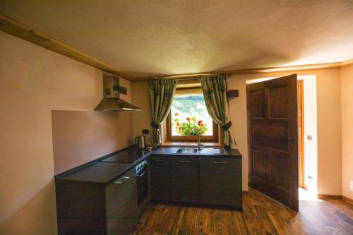 virtuve, Casa Vacanze Petit Haury - Alloggi ad uso turistico vda Arvier n 0039 e n 0040 - in Arvier