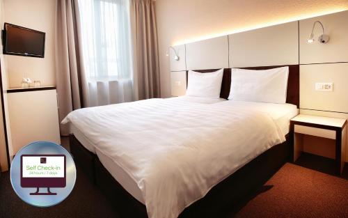 b-smart motel Basel, Basel (Foto 10)