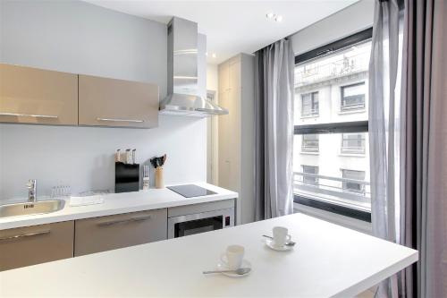 Habitat Parisien - Appartement Opéra Galeries Lafayette 5