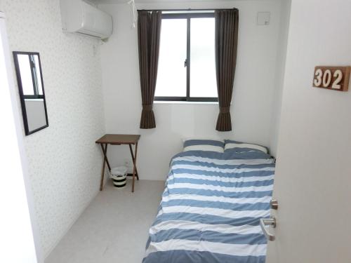 Double Room with Small Double Bed with Shared Bathroom - Room Only