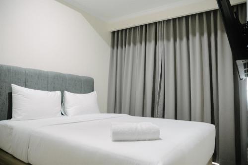 Two-Bedroom Apartment room in 2BR Deluxe and Modern Menteng Park Apartment By Travelio