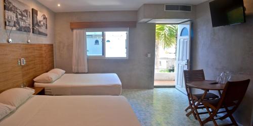 Hotel Rio Malecon Room Type - Deluxe Quadruple Room