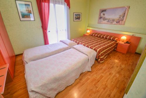 Hotel Benaco Room Type - Quadruple Room with Balcony