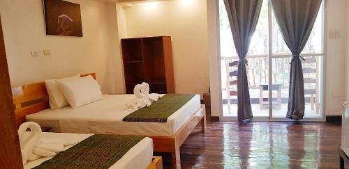 DiveGurus Boracay Beach Resort Room Type - Deluxe Family Room DiveGurus Boracay Beach Resort Room Type - Deluxe Family Room