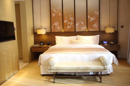 Premium King Room with Courtyard View room in HUALUXE Shanghai Twelve At Hengshan By IHG
