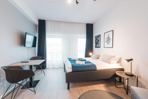 Forenom Serviced Apartments Helsinki Mansku - Tap to explore photos