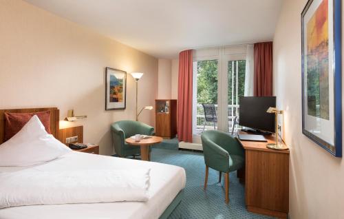Best Western Premier Parkhotel Bad Mergentheim Set in a prime location of Bad Mergentheim, Best Western Premier Parkhotel Bad Mergentheim puts everything the city has to offer just outside your doorstep. The hotel offers guests a range of services