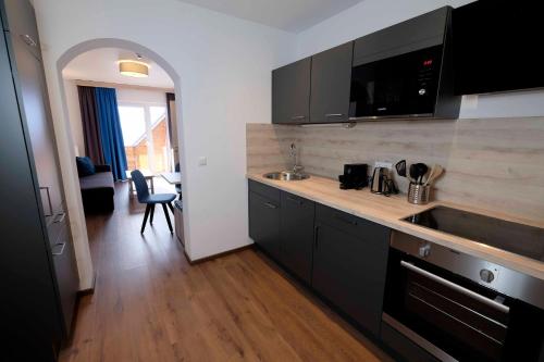 Cocina, Haus Karnia Appartements & Zimmer in Hermagor