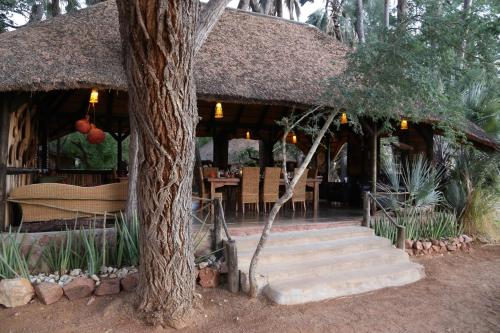 Krogs/atpūtas telpa, Epupa Camp in Otjivakuanda