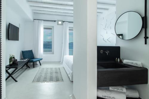 Nimbus Mykonos Set in a prime location of Mykonos, Nimbus Mykonos puts everything the city has to offer just outside your doorstep. The property features a wide range of facilities to make your stay a pleasant exper