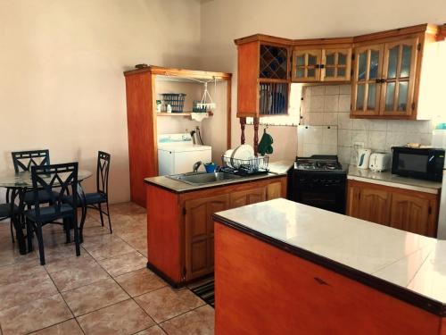 Kitchen, Nicolodge Apartments in Oistins