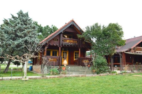  Ξύλινο σπίτι (κορμόσπιτο, μεζονέτα, EcoHouse) in Nea Artaki