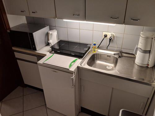 廚房, Ferienwohnung mit Terrasse in 格里馬