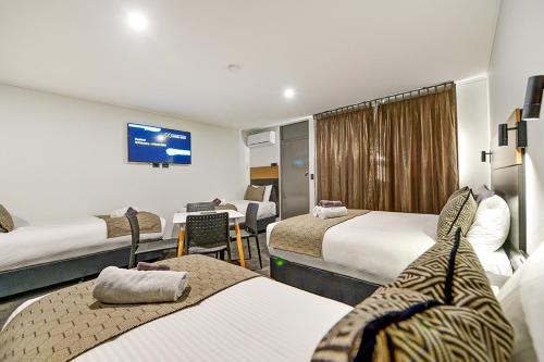 CBD Motor Inn Set in a prime location of Coffs Harbour, CBD Motor Inn puts everything the city has to offer just outside your doorstep. Featuring a satisfying list of amenities, guests will find their stay at the p
