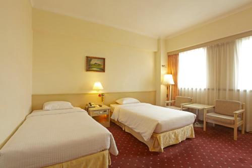 Standard Twin Room room in Emperor Hotel