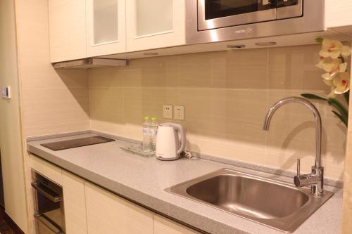 Qingdao Elegant Central Apartment - image 4