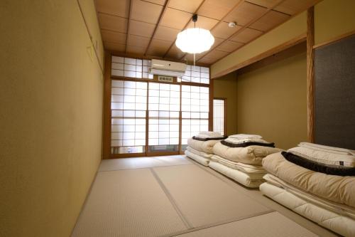Trip & Sleep Hostel Room Type - Triple Room with Shared Bathroom