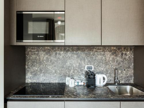 easyhomes-Duomo Suites & Apartments - main image