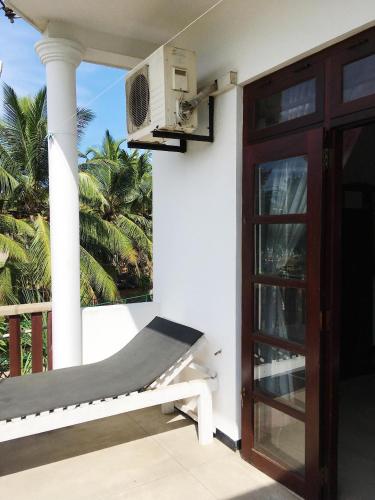 Deluxe Double Room with Balcony and Sea View room in Ceylon Surf Guest Holiday Resort