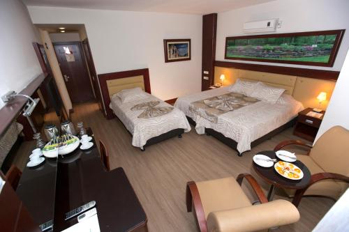 Chambre triple, vue sur la mer, 3 lits