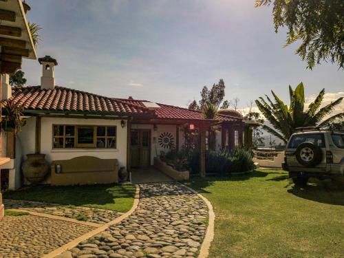 Dārzs, Hostal Mamá Hilda (Hostal Mama Hilda) in Chugchilán