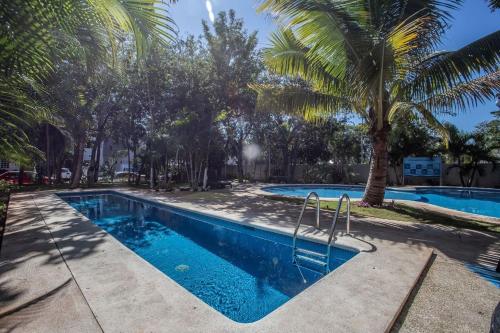 La Casa del Mexicano terraza y jardin exoticos 12 min del playa Esmeralda