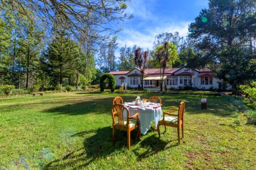 SaffronStays Milton Abbott Estate - 2BR colonial-era bungalow with garden, golf course views & bonfire nights near Ooty Golf Club - Upper Bhavani Reservior