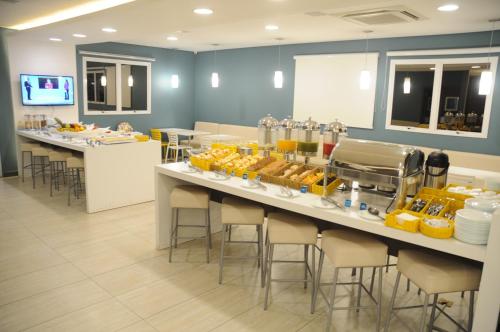 อาหารและเครื่องดื่ม, Golden Tower Aeroporto - Lizz - by Fenix Hoteis in อุเบอร์ลันเดีย