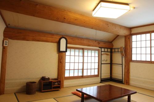 Japanese-Style Family Room with Shared Bathroom