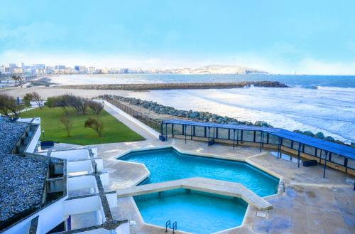 UMH Tarik Hotel Stop at Hotel Tarik to discover the wonders of Tangier. The property features a wide range of facilities to make your stay a pleasant experience. Service-minded staff will welcome and guide you at Hot